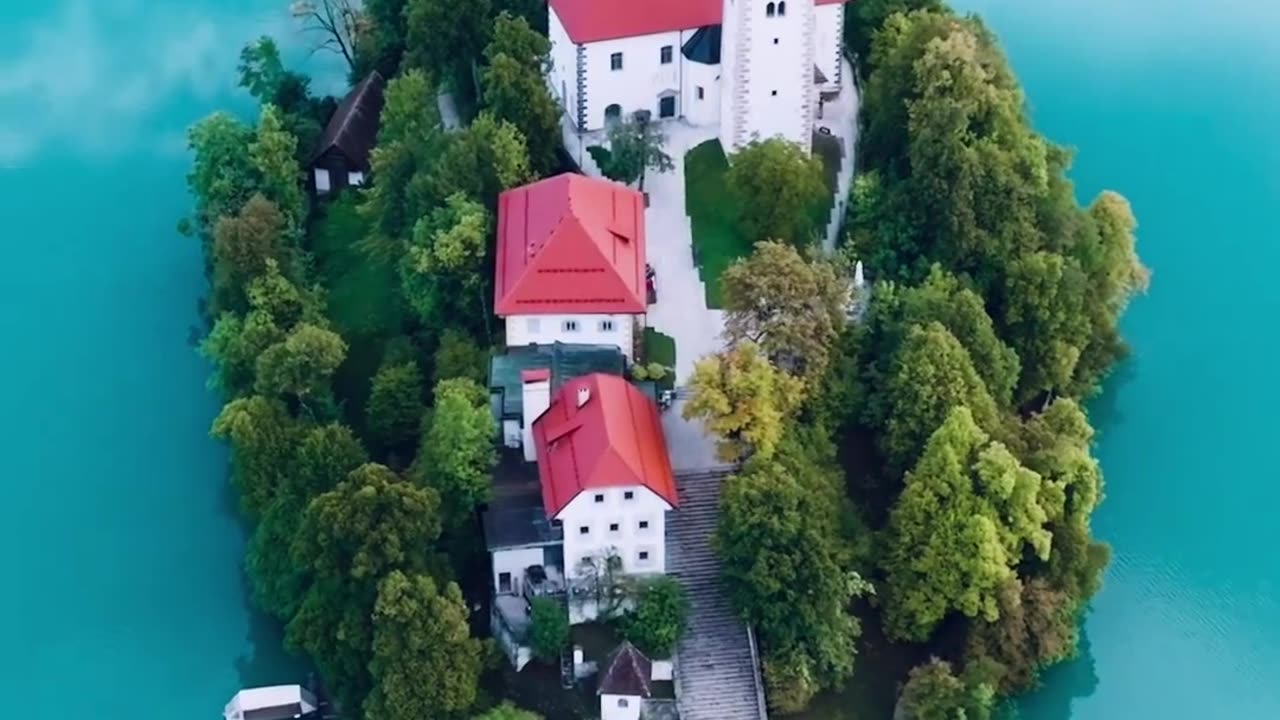 Tiny Island With An Ancient Church In Solvenia