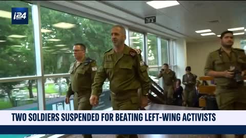 Two Israeli soldiers suspended for beating left-wing activists