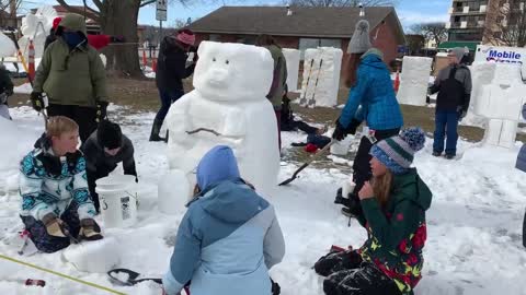 Watch now: Local students put the finishing touches on their snow sculpture