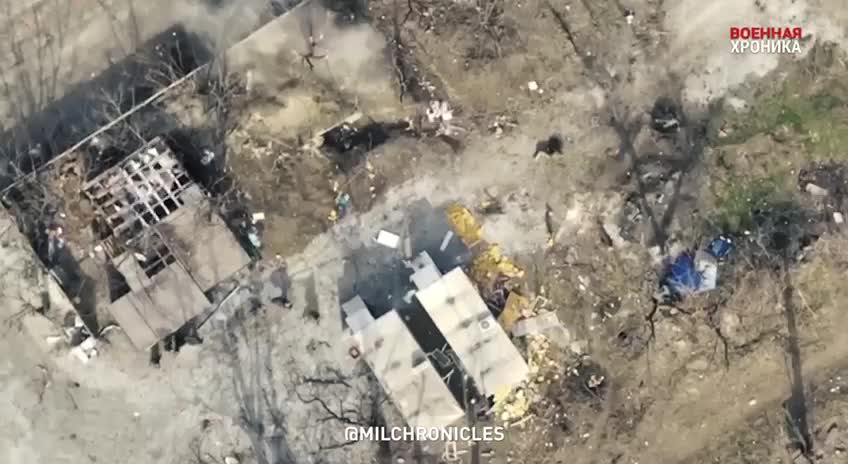 Aerial view of Russian forces striking Ukranian targets with explosives