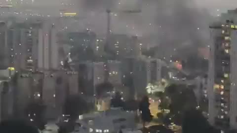 Initial reports of a rocket striking a site in the Tel Aviv area.