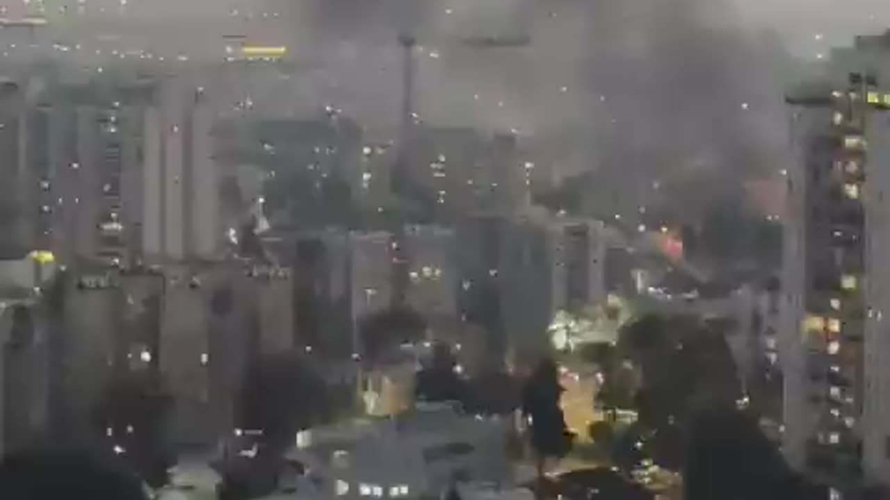 Initial reports of a rocket striking a site in the Tel Aviv area.