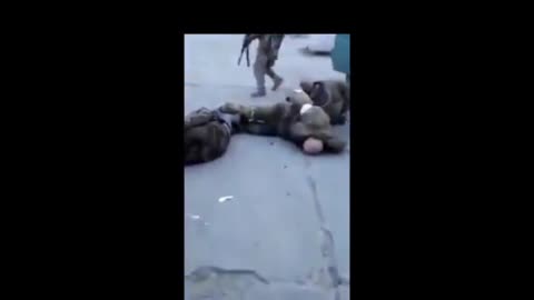 Ukrainian Troops Commit War Crime by Shooting Captured Russian Soldiers