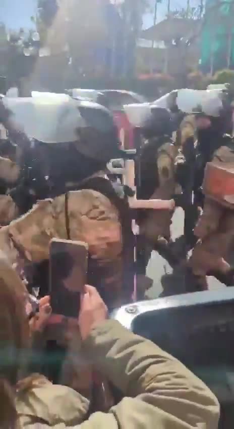 Bolivia Coup - heavily armed soldiers and vehicles gathering in the capital's Plaza Murillo square.