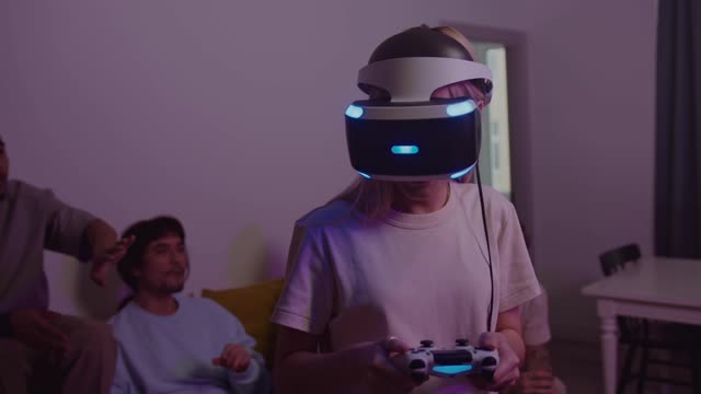 Woman Playing Video Game With Virtual Reality Glasses