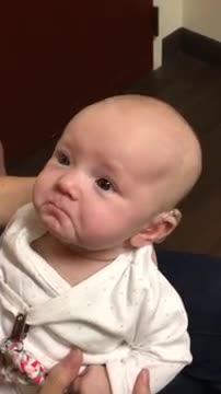 My baby hears me for the first time and is almost moved to tears!