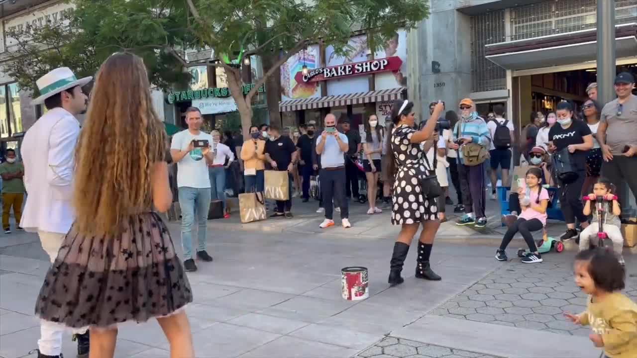 1 year old baby joins "dance money" Street performance