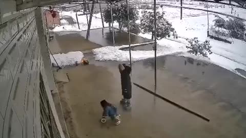 kid knocks over support and goes inside seconds before roof collapses.