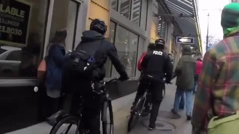 Arrested for being in the way of the police