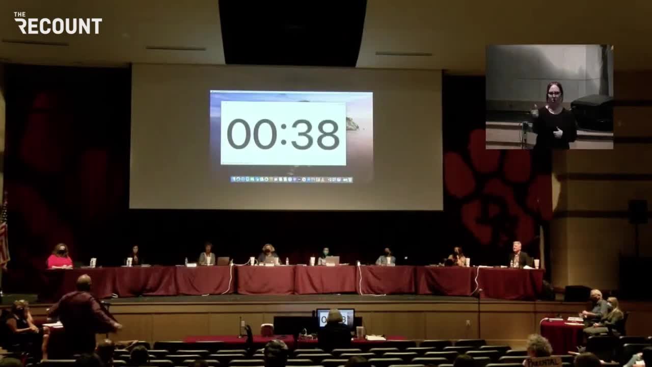 Texas Dad Strips Down to Swimsuit at School Board Meeting to Make a Statement About Masks