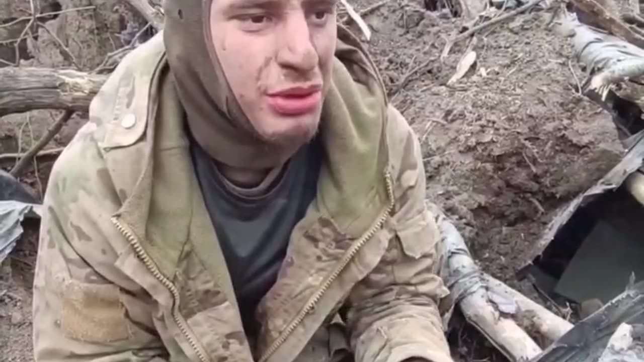 Lone Ukrainian soldier is captured in a trench