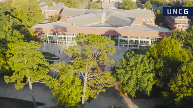 Aerial views of UNC Greensboro's vibrant fall campus