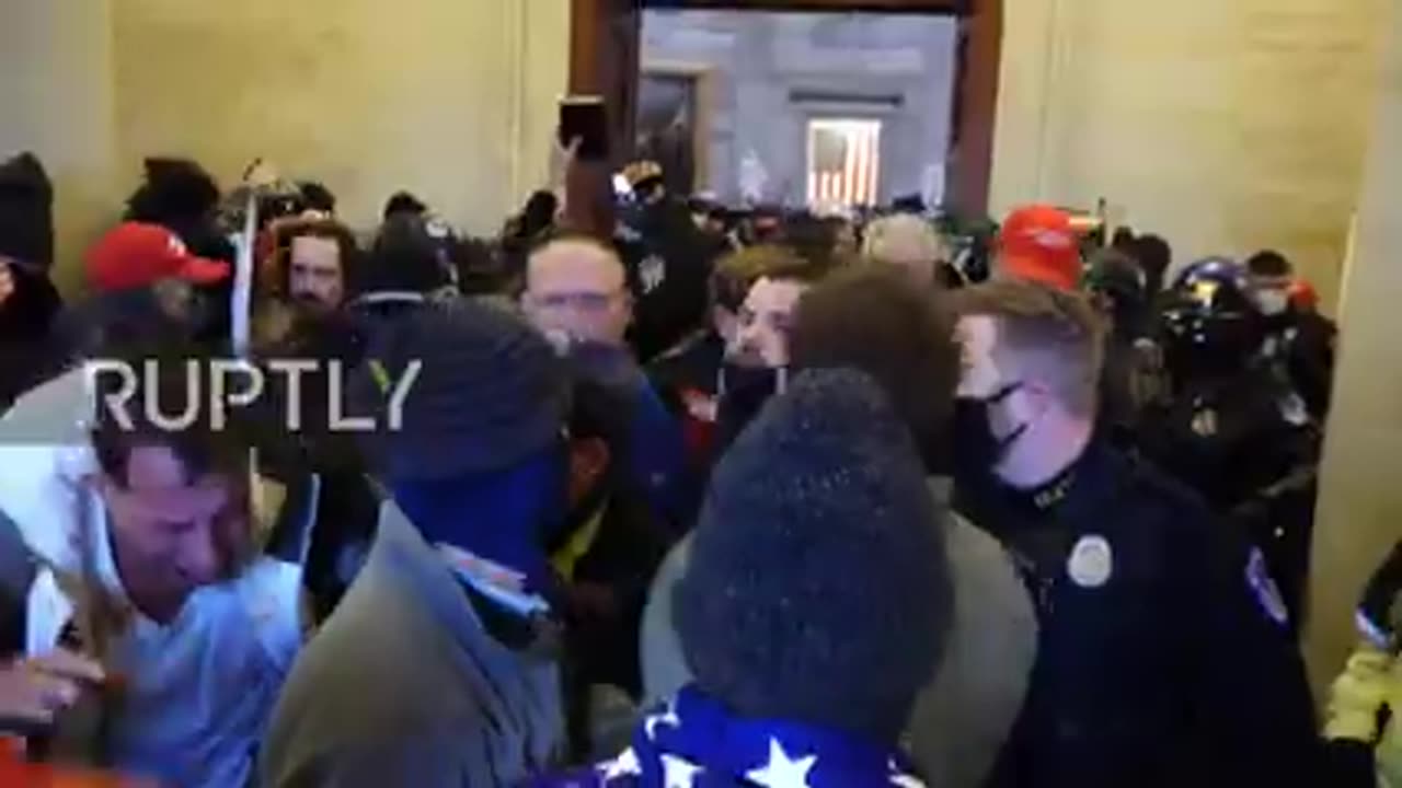 2021, USA- Trump supporters and law enforcement clash inside DC Capitol after storming