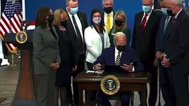 Joe Biden signs without reading bill