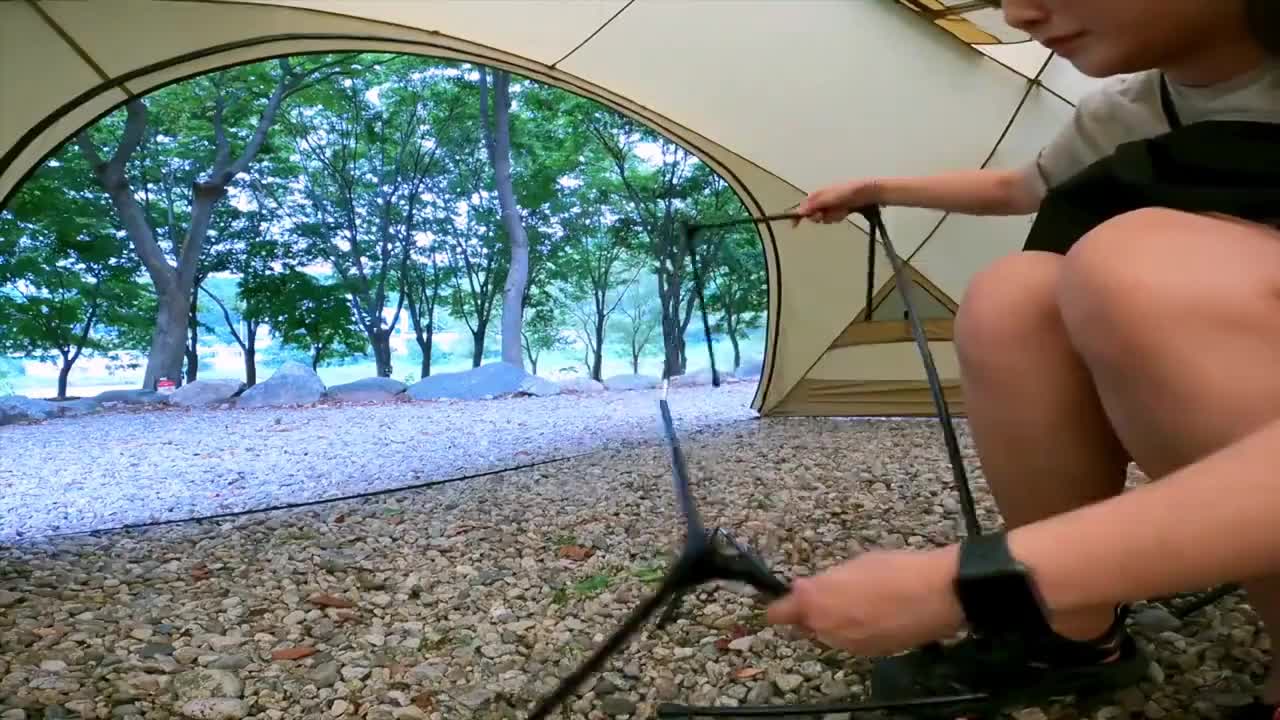 Single person outdoor camping, enjoying delicious food. Eating outside seems more delicious than at