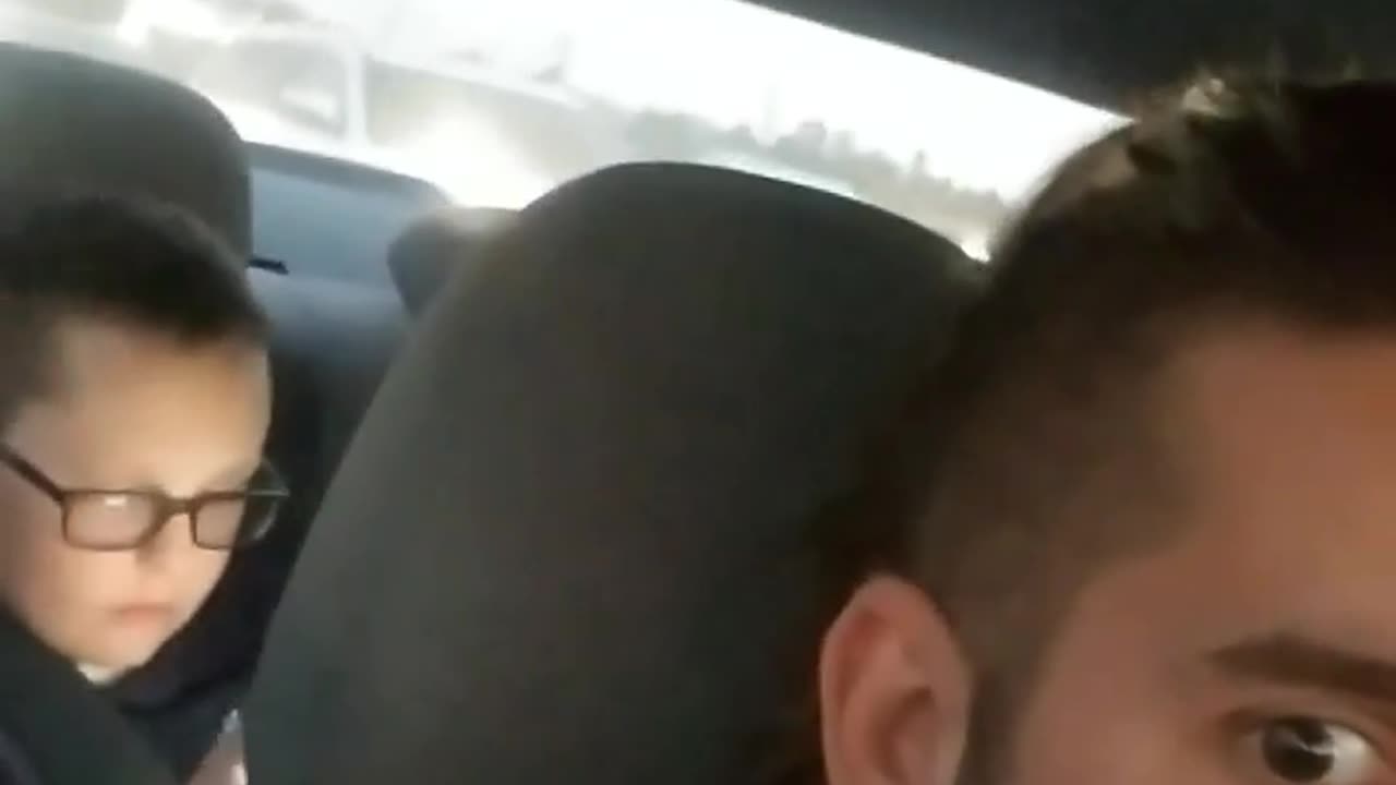 Kid caught singing "I saw the sign."