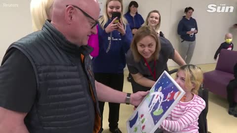 NASA astronaut visits children recovering from war injuries in Kyiv hospital