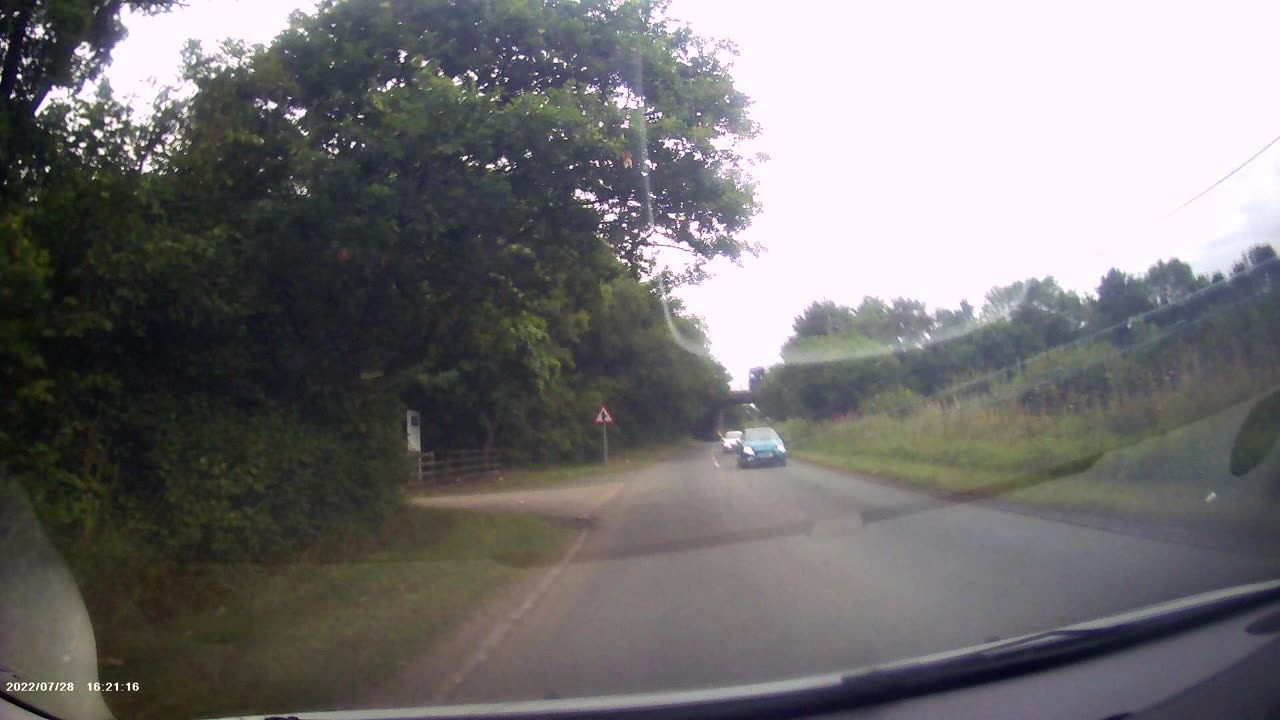 Man Strolling Down a Carriageway