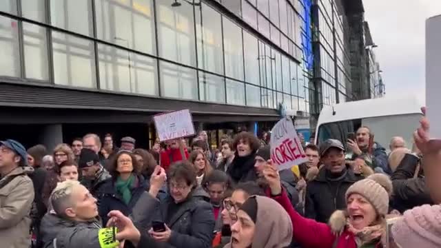 Protesters surround Pfizer building