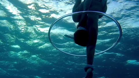 Butta ring l making a water ring under water and a person going through it l