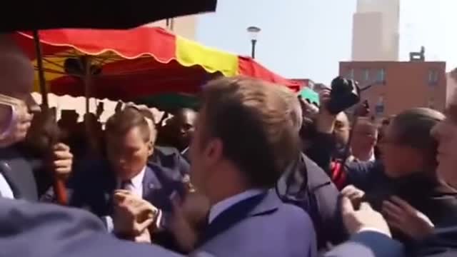 Newly re-elected French President Emmanuel Macron gets pelted with a tomato