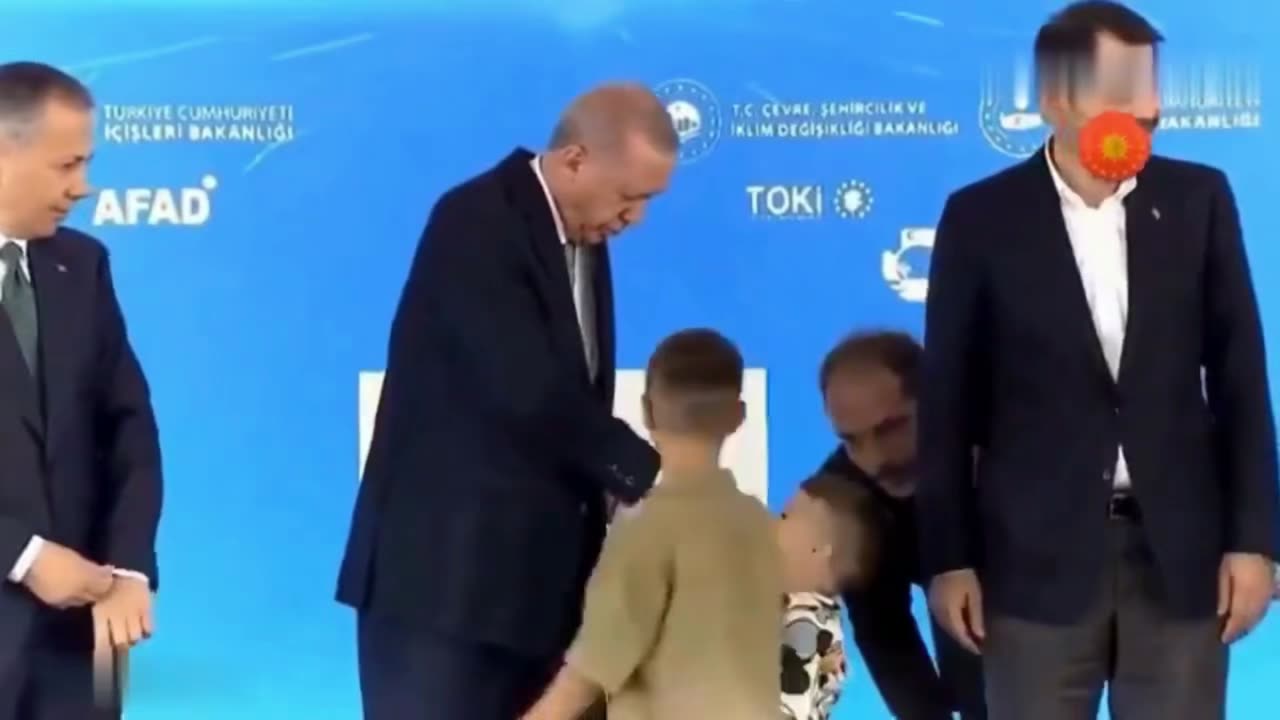 ERODOGAN SLAPS A CHILD