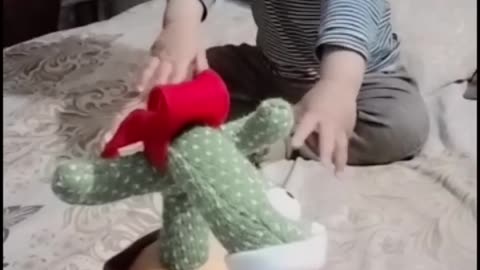 Cute baby playing with a beautiful toy