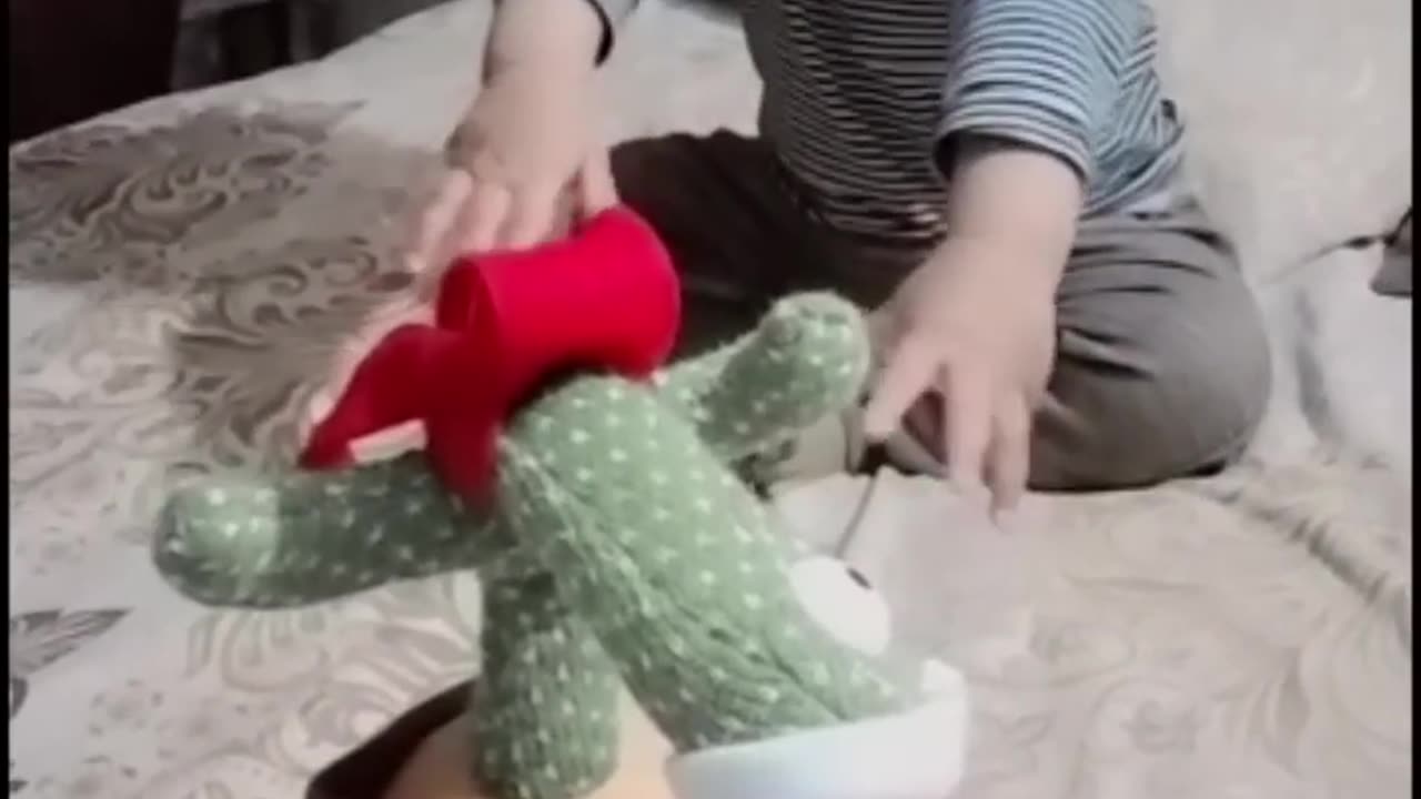 Cute baby playing with a beautiful toy