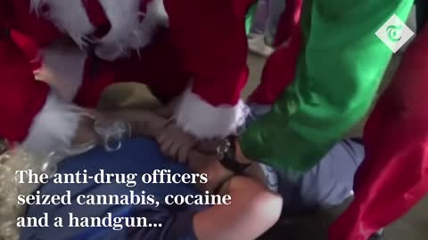 Police dress as Santa and his elf to raid suspected drug den in Peru