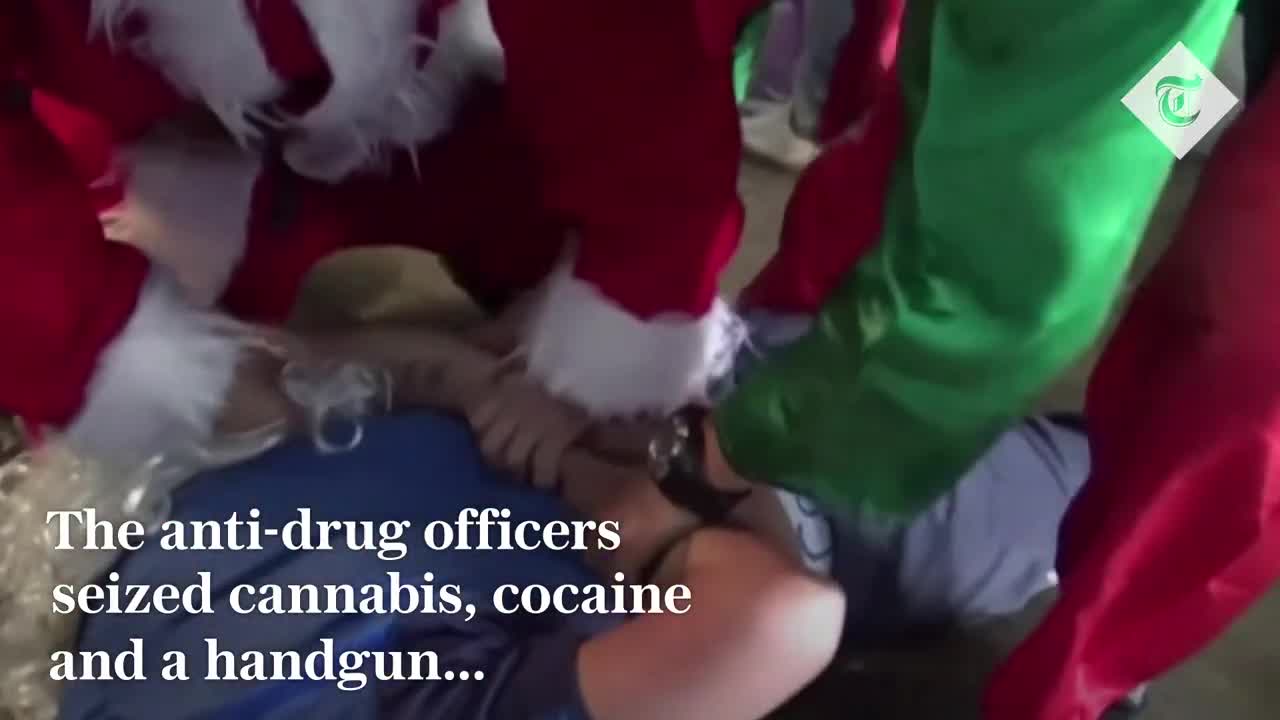 Police dress as Santa and his elf to raid suspected drug den in Peru