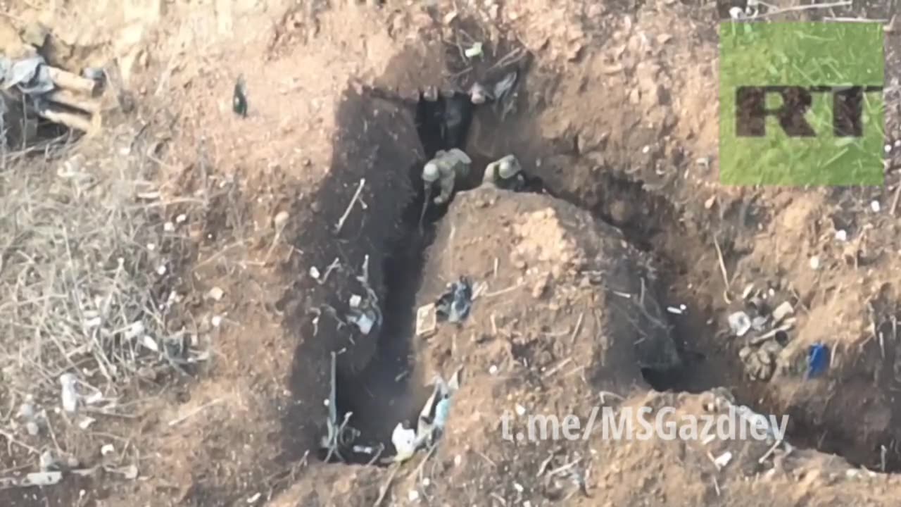 Ukrainian and Russian soldiers have duel in trenches.