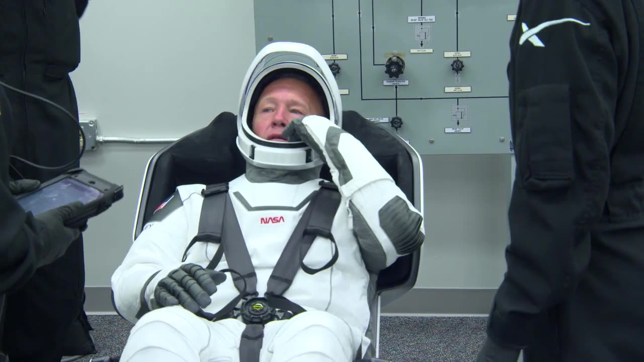 Crew Members Suit Up for Flight to International Space Station