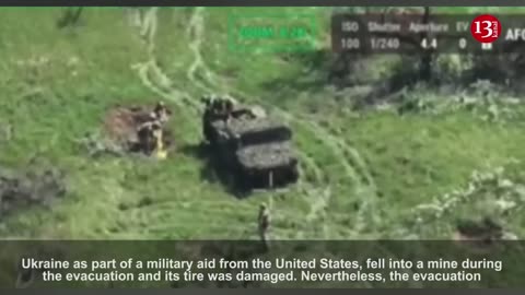 Ukrainians evacuating their fellow soldiers from a mine field with US Humvee vehicle near Bakhmut