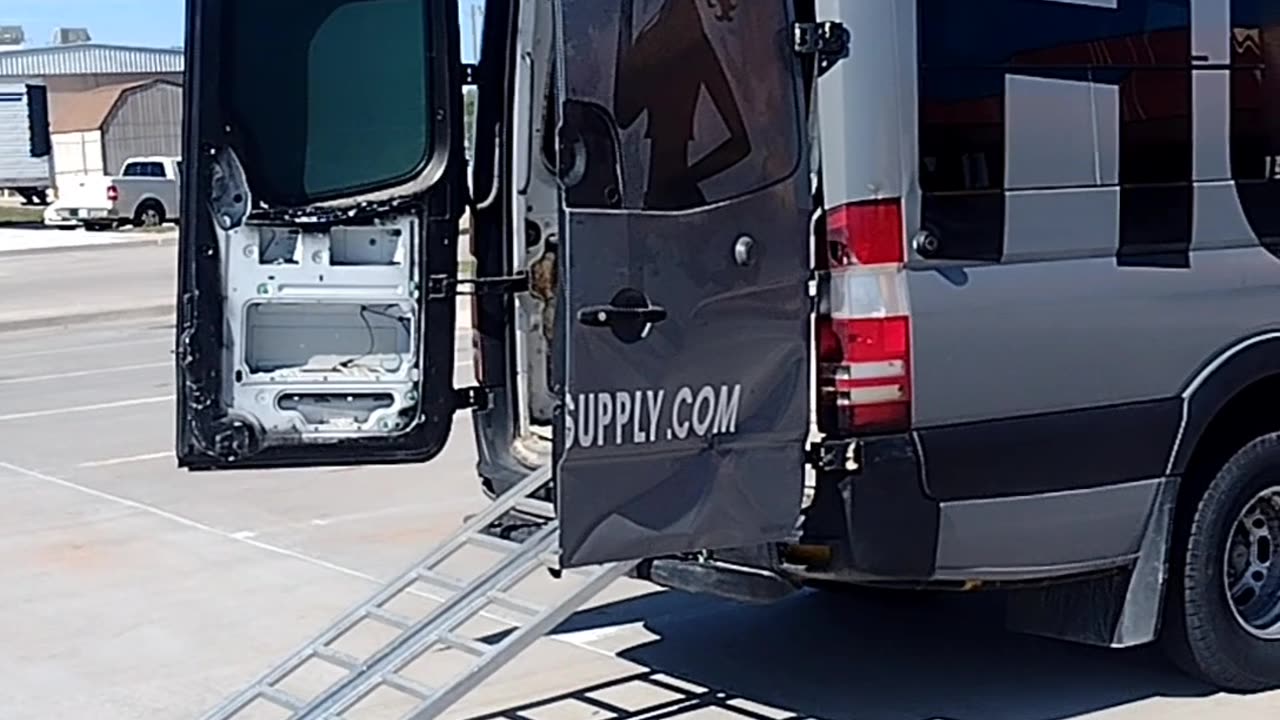 Drives motorcycle into sprinter van