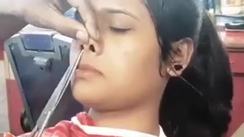 Cute girl getting face shaved