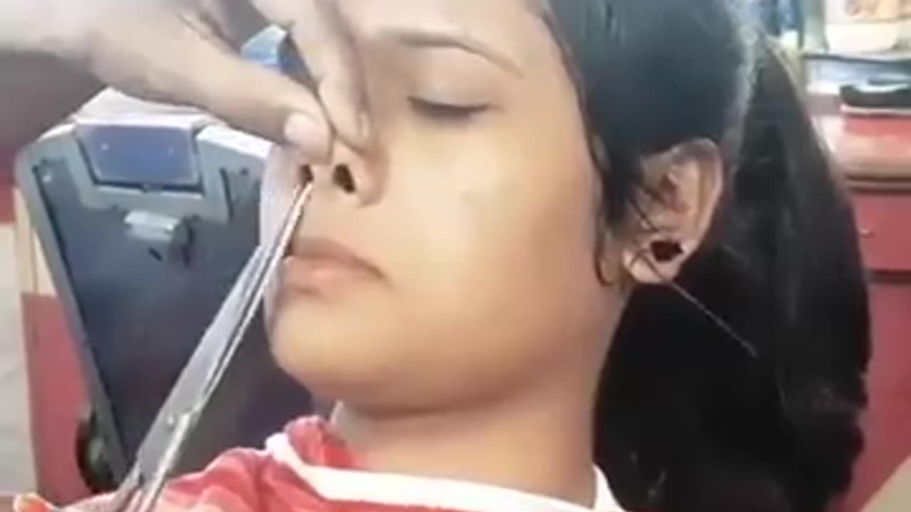 Cute girl getting face shaved