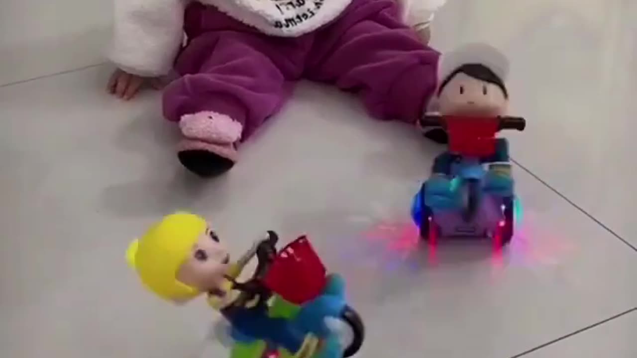 Cute baby playing with toys