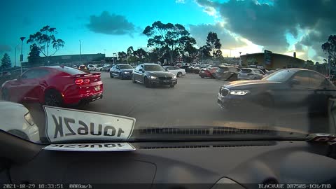 Guy Burning Out Tires in Traffic Receives Instant Karma