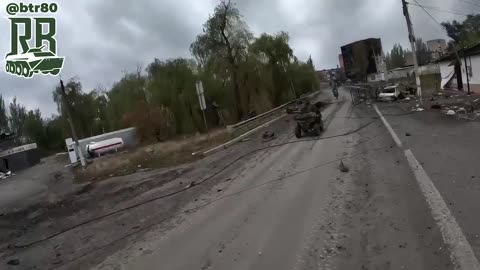 Russian "Center" Group Stormtrooper riding through the streets of Selidovo