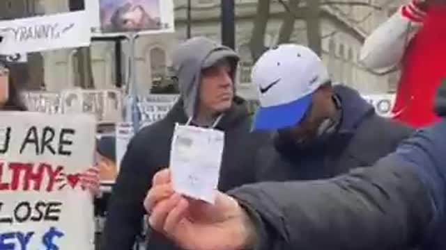 Vaccinated People Rip Up Vaccine Passports in Protest