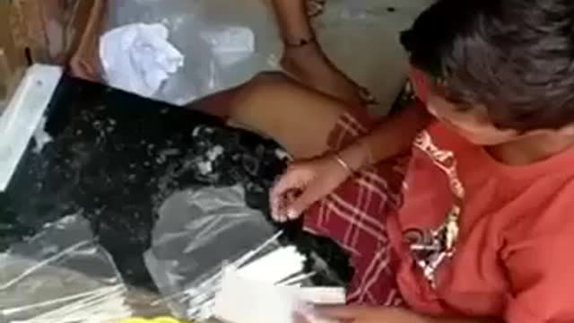 Children packaging items for sale.