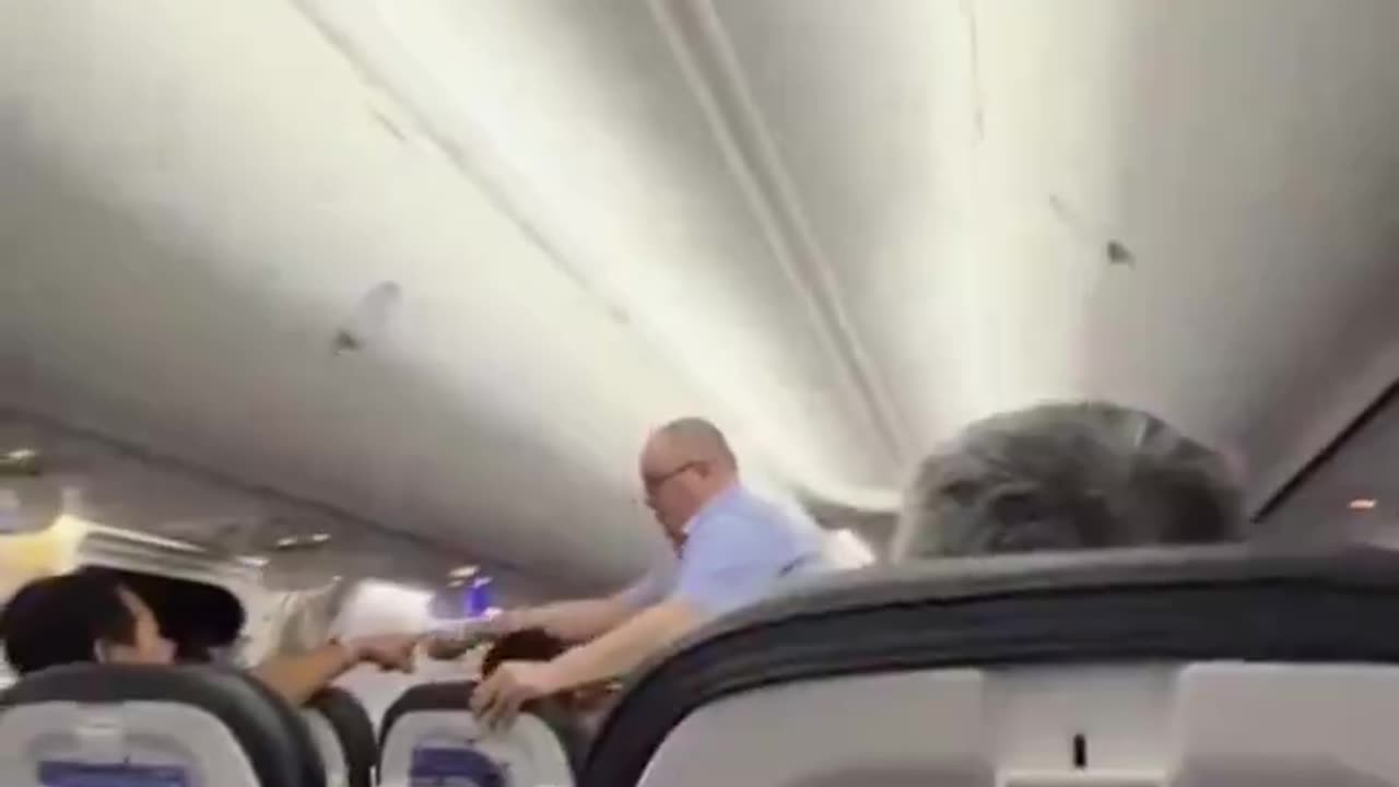 A piece of the wall on an Alaska Airlines flight popped off mid-flight