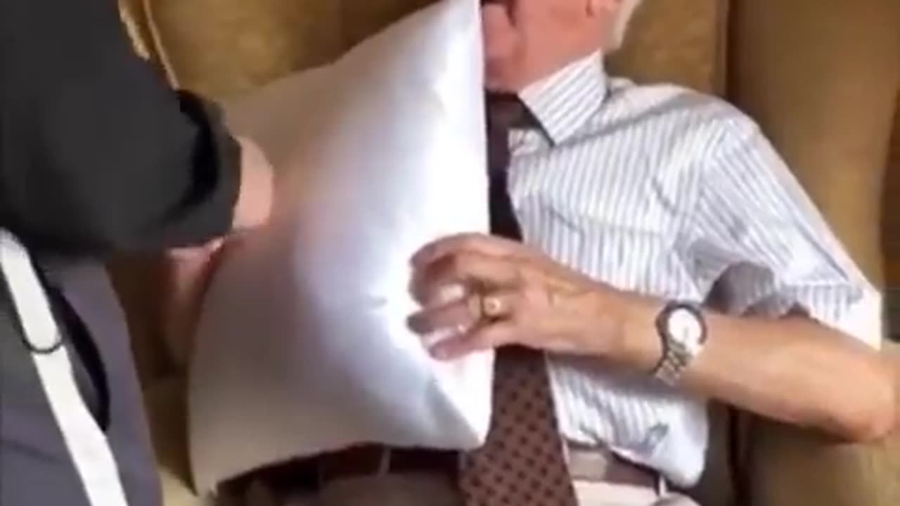 Care workers surprise 94 year old veteran with a pillow of his wife’s face