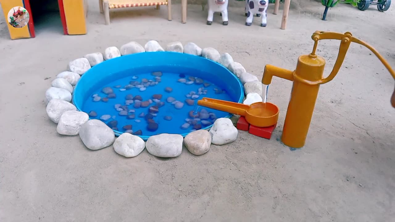 mini hand pump project with concrete stone swimming pool (7)