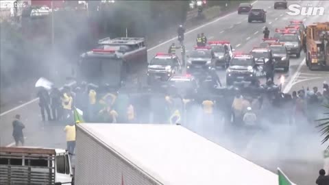 Brazilian police fire water cannons and rubber bullets at anti Lula protesters