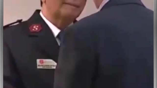 Biden confuses a member of the Salvation Army for the Secret Service
