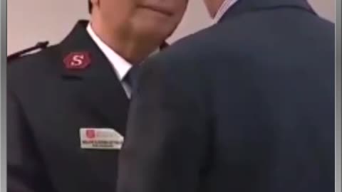 Biden confuses a member of the Salvation Army for the Secret Service