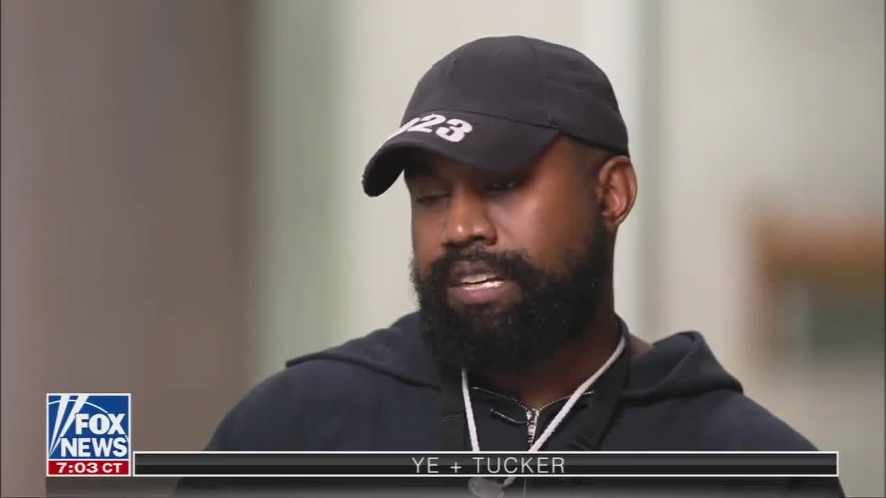 Kanye West says people around him "basically said that I would be killed" for wearing a MAGA hat