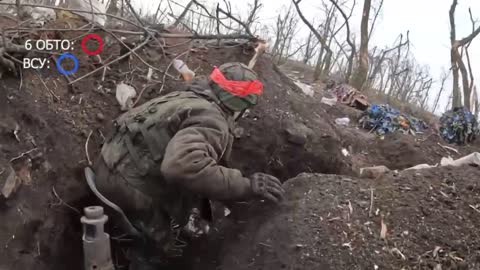 DPR soldiers storming the Ukrainian positions.