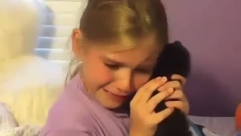 Girl started to cry, because the puppy for a surprise